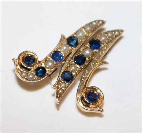 High carat gold and sapphire intial brooch